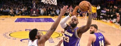 Los Angeles Lakers forward LeBron James (23) drives past Philadelphia 76ers center Joel Embiid (21) in the second half at Crypto.com Arena.