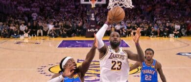 Los Angeles Lakers forward LeBron James (23) drives past Oklahoma City Thunder guard Luguentz Dort (5) during game three of the second round of the 2026 NBA Playoffs at Crypto.com Arena.