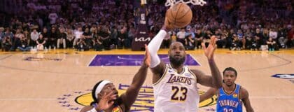 Los Angeles Lakers forward LeBron James (23) drives past Oklahoma City Thunder guard Luguentz Dort (5) during game three of the second round of the 2026 NBA Playoffs at Crypto.com Arena.