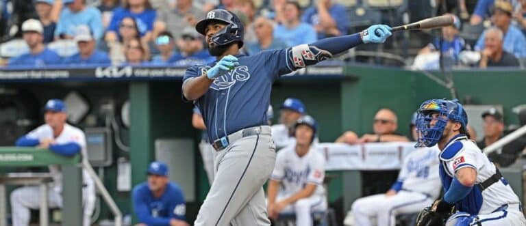 Tampa Bay Rays third baseman Junior Caminero (13) hits a two-run home run in the first inning against the Kansas City Royals at Kauffman Stadium