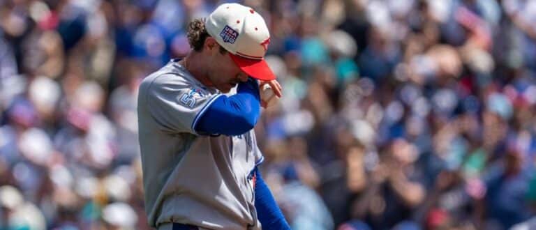 Toronto Blue Jays starting pitcher Shane Bieber (57) reacts after giving up a grand slam home run during the second inning against the Seattle Mariners at T-Mobile Park