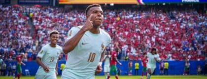 France's Kylian Mbappe celebrates scoring their first goal
