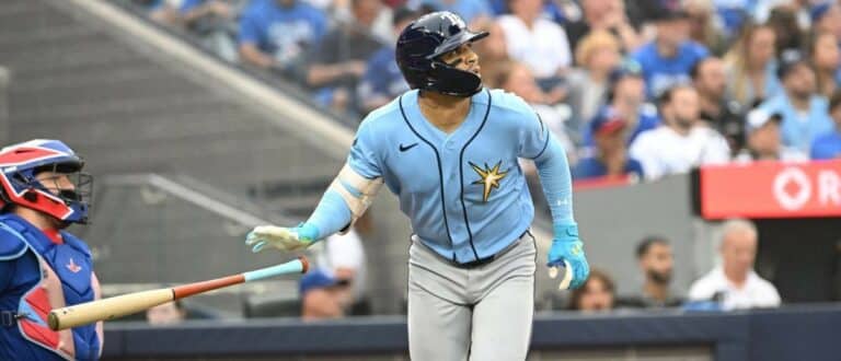 Tampa Bay Rays right fielder Victor Mesa Jr. (25) hits a solo home run against the Toronto Blue Jays in the second inning at Rogers Centre.