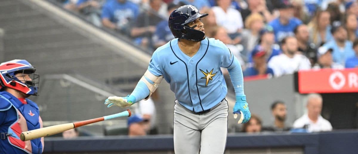 Tampa Bay Rays right fielder Victor Mesa Jr. (25) hits a solo home run against the Toronto Blue Jays in the second inning at Rogers Centre.