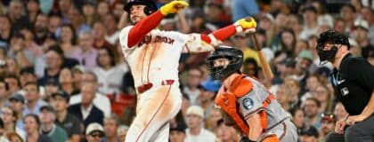 Boston Red Sox first baseman Willson Contreras (40) hits a one run RBI double against the Baltimore Orioles during the sixth inning at Fenway Park.