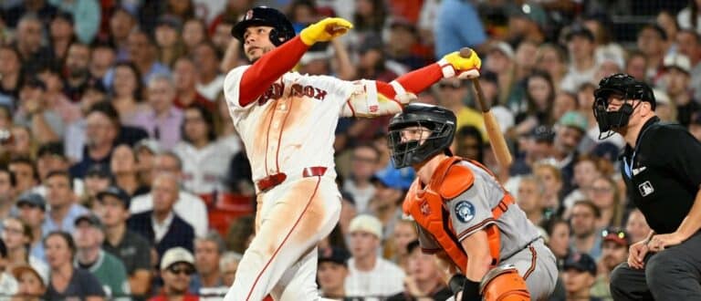 Boston Red Sox first baseman Willson Contreras (40) hits a one run RBI double against the Baltimore Orioles during the sixth inning at Fenway Park.