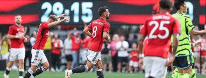 Manchester United midfielder Bruno Fernandes (8) celebrates his goal with teammates during the first half against Arsenal at MetLife Stadium.