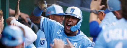 Kansas City Royals designated hitter Salvador Perez (13) celebrates in the dugout after hitting a home run during the fourth inning against the Detroit Tigers at Kauffman Stadium.