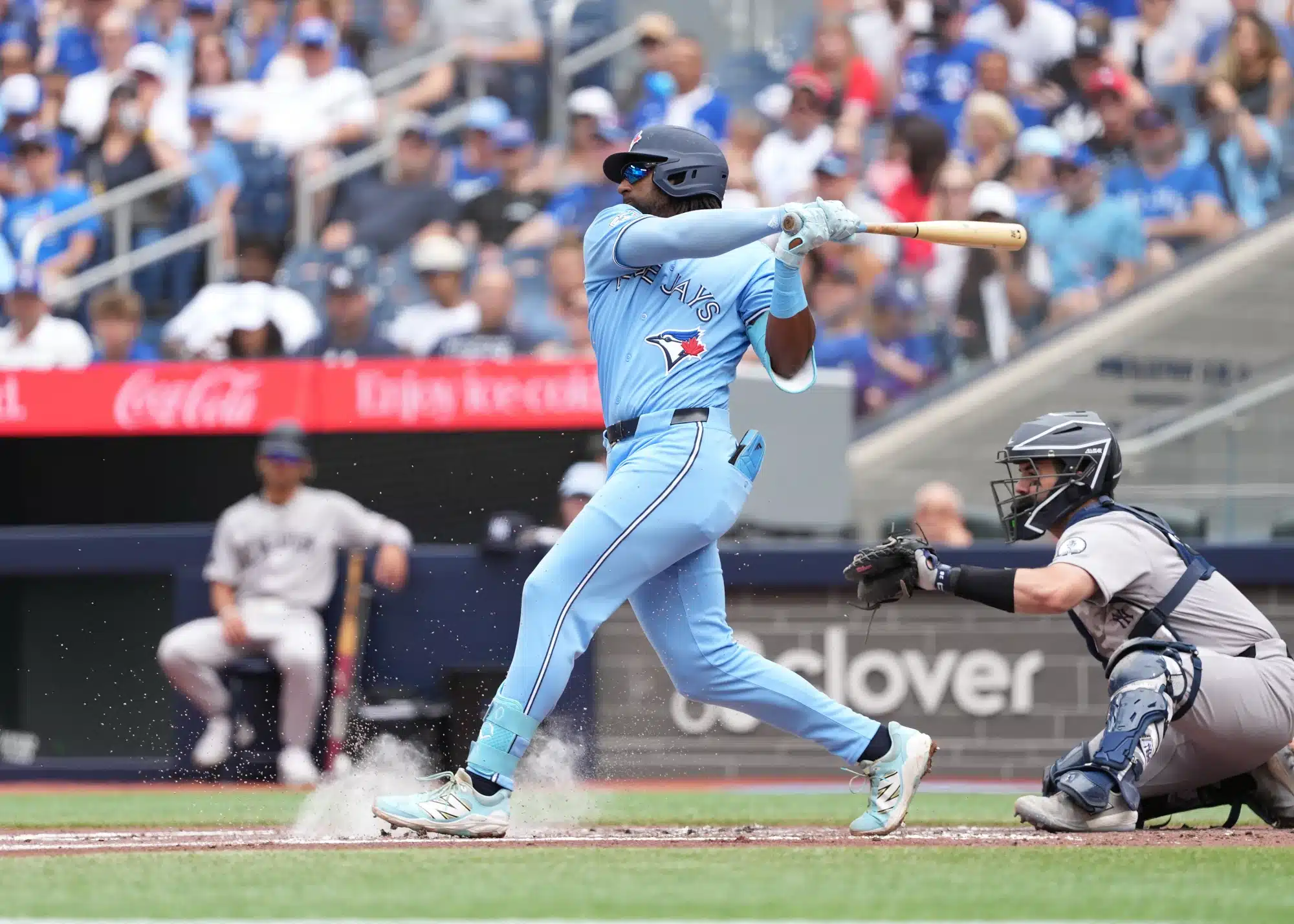Aug 16, 2026; Toronto, Ontario, CAN; Toronto Blue Jays first baseman Charles McAdoo (26) hits a single against the New York Yankees during the fourth inning at Rogers Centre.