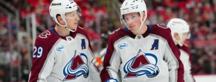 Colorado Avalanche center Nathan MacKinnon (29) and defenseman Cale Makar (8) look on against the Carolina Hurricanes during the third period at Lenovo Center. Mandatory Credit: James Guillory-Imagn Images