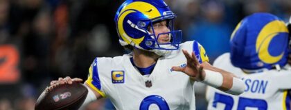 Los Angeles Rams quarterback Matthew Stafford (9) drops back to pass against the Carolina Panthers in the first half during the NFC Wild Card Round game at Bank of America Stadium. Mandatory Credit: Jim Dedmon-Imagn Images