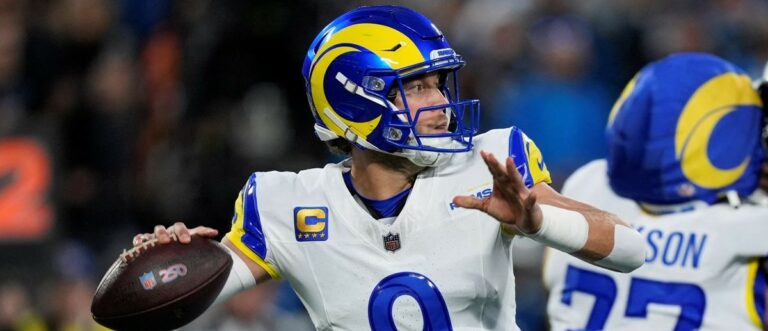 Los Angeles Rams quarterback Matthew Stafford (9) drops back to pass against the Carolina Panthers in the first half during the NFC Wild Card Round game at Bank of America Stadium. Mandatory Credit: Jim Dedmon-Imagn Images