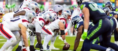 New England Patriots center Garrett Bradbury (65) prepares to snap the ball to quarterback Drake Maye (10) against the Seattle Seahawks during Super Bowl LX at Levi's Stadium.