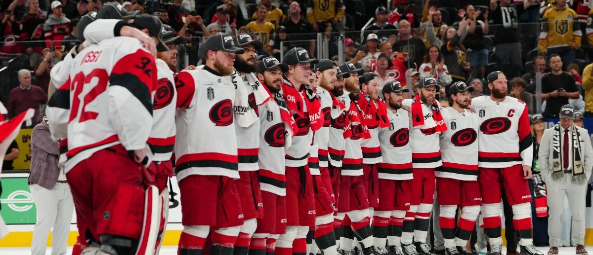 Carolina Hurricanes center Jordan Staal (11) with team await the presentation of the the Stanley Cup after defeating the Vegas Golden Knights in game six of the 2026 Stanley Cup Final at T-Mobile Arena. Mandatory Credit: Stephen R. Sylvanie-Imagn Images