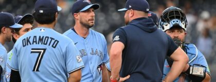 Toronto Blue Jays manager John Schneider (14) pays a visit to the mound to see pitcher Max Scherzer (31) against the Washington Nationals during the third inning at Nationals Park. Mandatory Credit: Rafael Suanes-Imagn Images
