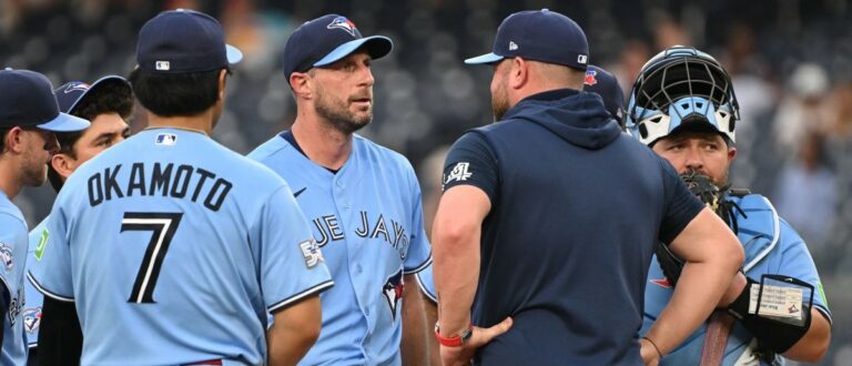 Toronto Blue Jays manager John Schneider (14) pays a visit to the mound to see pitcher Max Scherzer (31) against the Washington Nationals during the third inning at Nationals Park. Mandatory Credit: Rafael Suanes-Imagn Images