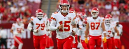 Kansas City Chiefs quarterback Patrick Mahomes (15) leads the team onto the field before a preseason game against the Tampa Bay Buccaneers at Raymond James Stadium. Mandatory Credit: Nathan Ray Seebeck-Imagn Images