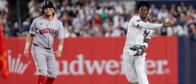 New York Yankees second baseman Jazz Chisholm Jr. (13) throws to first for a double play against the Boston Red Sox during the fifth inning at Yankee Stadium. Mandatory Credit: Tom Horak-Imagn Images