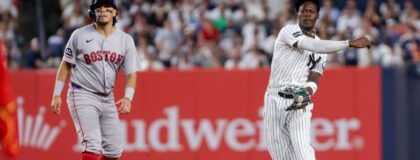 New York Yankees second baseman Jazz Chisholm Jr. (13) throws to first for a double play against the Boston Red Sox during the fifth inning at Yankee Stadium. Mandatory Credit: Tom Horak-Imagn Images
