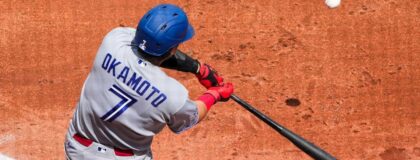 Toronto Blue Jays third baseman Kazuma Okamoto (7) at bat against the Kansas City Royals during the fifth inning at Kauffman Stadium.
