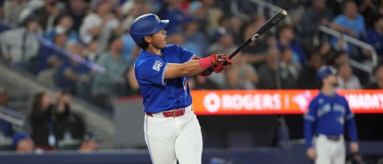 Toronto Blue Jays third baseman Kazuma Okamoto (7) hits a three run home run against the Detroit Tigers during the seventh inning at Rogers Centre. Mandatory Credit: John E. Sokolowski-Imagn Images