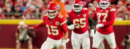 Kansas City Chiefs quarterback Patrick Mahomes (15) runs the ball during the first half against the Denver Broncos at Arrowhead Stadium. Mandatory Credit: Jay Biggerstaff-Imagn Images
