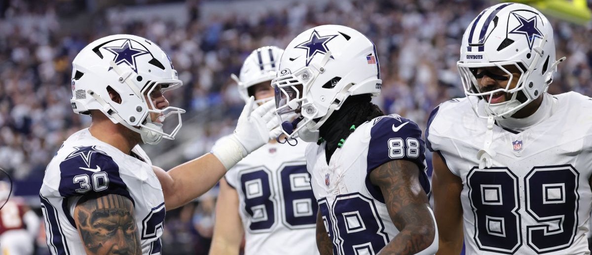 Dallas Cowboys wide receiver CeeDee Lamb (88) celebrates with tight end Brevyn Spann-Ford (89) and fullback Hunter Luepke (30) after catching a three-yard touchdown pass thrown by quarterback Dak Prescott (not pictured) against the Washington Commanders during the first quarter at AT&T Stadium. Mandatory Credit: Kevin Jairaj-Imagn Images