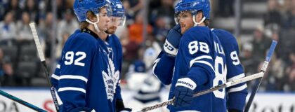 Toronto Maple Leafs forward William Nylander (88) speaks with forward Gavin McKenna (92) as they prepare for a faceoff against the Ottawa Senators in the first period at Scotiabank Arena. Mandatory Credit: Dan Hamilton-Imagn Images