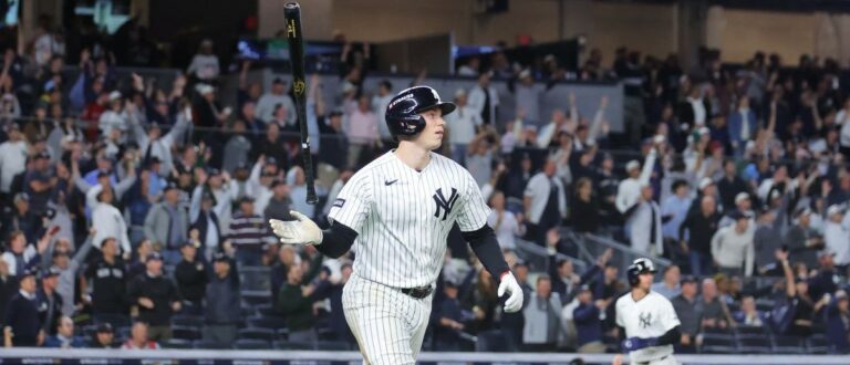 New York Yankees designated hitter Ben Rice (22) runs after hitting a grand slam home run against the Boston Red Sox during the eighth inning during game one of the Wildcard round for the 2026 MLB Playoffs at Yankee Stadium. Mandatory Credit: Brad Penner-Imagn Images
