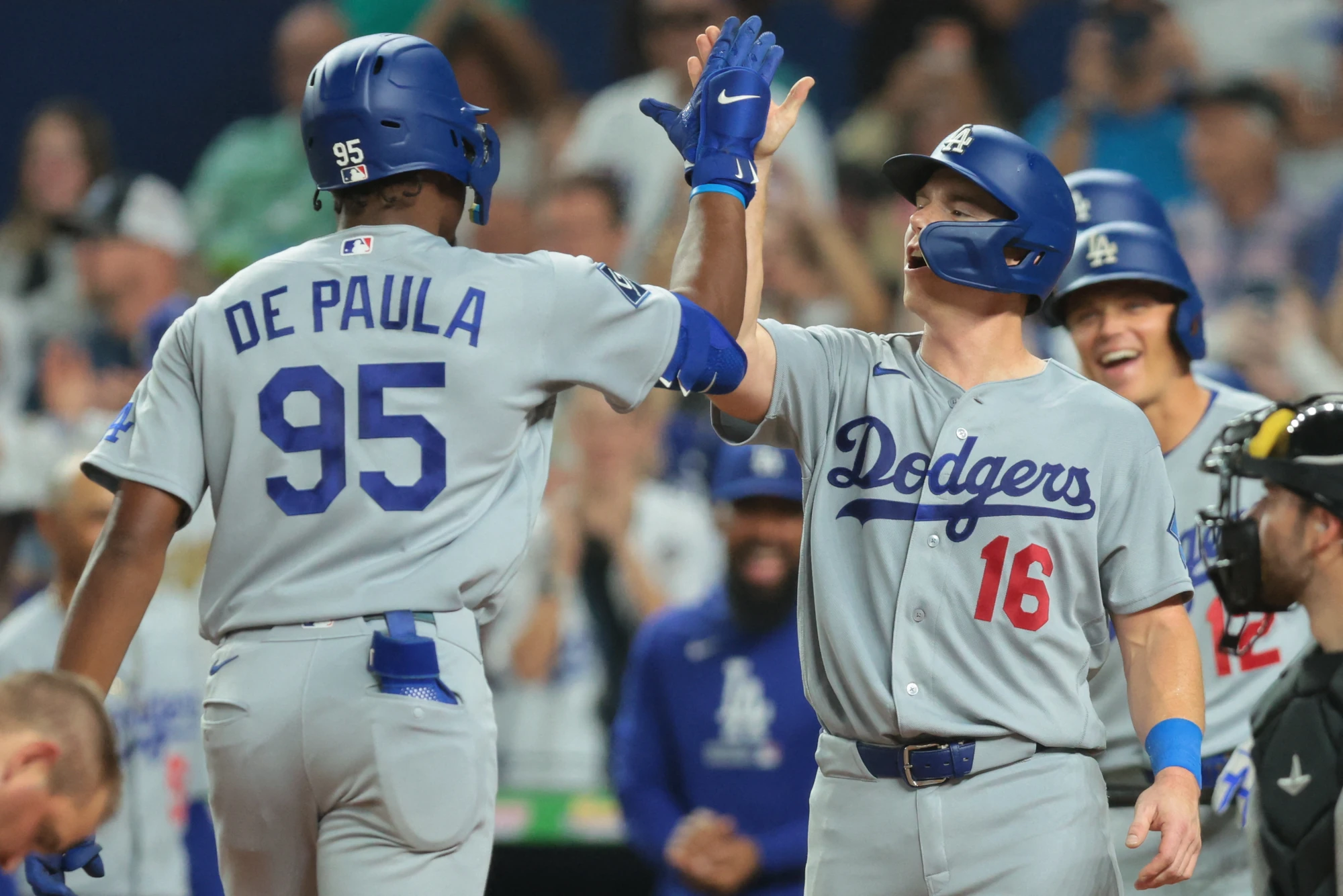 Sep 13, 2026; Miami, Florida, USA; Los Angeles Dodgers left fielder Josue de Paula (95) celebrates with catcher Will Smith (16) after hitting a three-run home run against the Miami Marlins during the fourth inning at loanDepot Park.