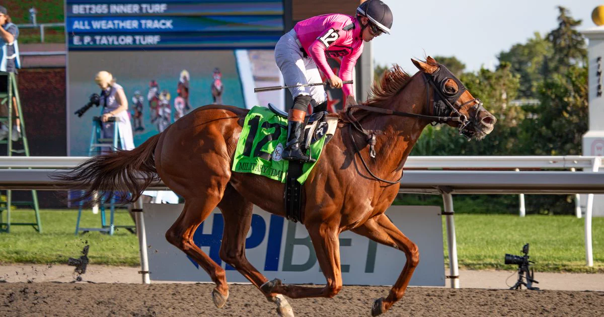 Military Time and jockey preparing for 2026 Prince of Wales Stakes on dirt track.