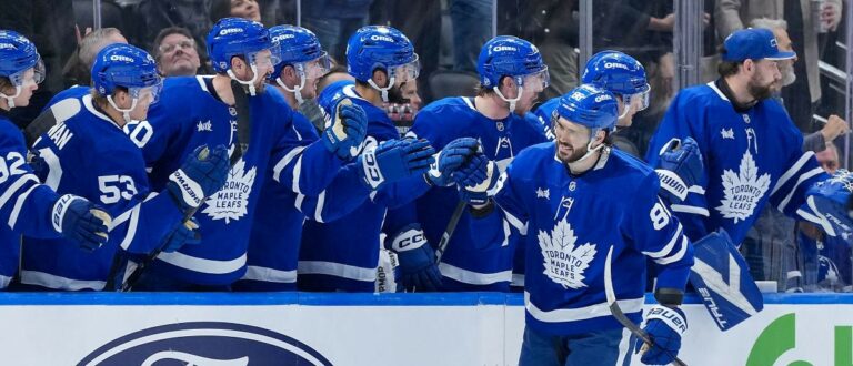 Toronto Maples Leafs right wing Kirill Marchenko (86) celebrates at the bench after scoring goal against the Ottawa Senators during the second period at Scotiabank Arena. Mandatory Credit: Nick Turchiaro-Imagn Images