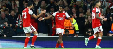UEFA Champions League - Arsenal v Lille - Emirates Stadium, London, Britain - October 13, 2026 Arsenal's Jurrien Timber celebrates scoring their first goal with Mikel Merino REUTERS/Hannah Mckay