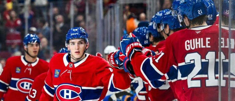 Montreal Canadiens defenseman Lane Hutson (48) celebrates with his teammates at the bench his goal against the Buffalo Sabres during the first period at Bell Centre. Mandatory Credit: David Kirouac-Imagn Images