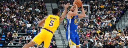 Golden State Warriors guard Stephen Curry (30) takes a shot against Los Angeles Lakers guard Quentin Grimes (5) in the third quarter at T-Mobile Arena. Mandatory Credit: Candice Ward-Imagn Images