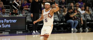 Phoenix Suns guard Devin Booker (15) points after scoring against the Utah Jazz in the second half at Mortgage Matchup Center. Mandatory Credit: Anna Carrington-Imagn Images