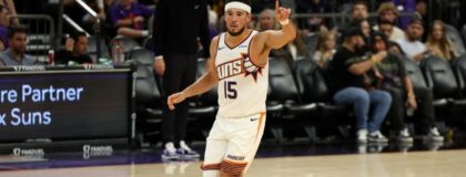 Phoenix Suns guard Devin Booker (15) points after scoring against the Utah Jazz in the second half at Mortgage Matchup Center. Mandatory Credit: Anna Carrington-Imagn Images
