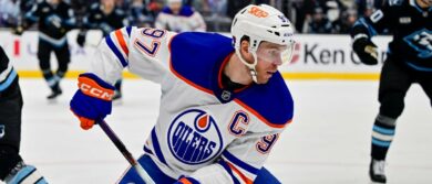 Edmonton Oilers center Connor McDavid (97) makes a quick move with the puck around Utah Mammoth defenseman John Marino (6) during first period at Delta Center. Mandatory Credit: Peter Creveling-Imagn Images