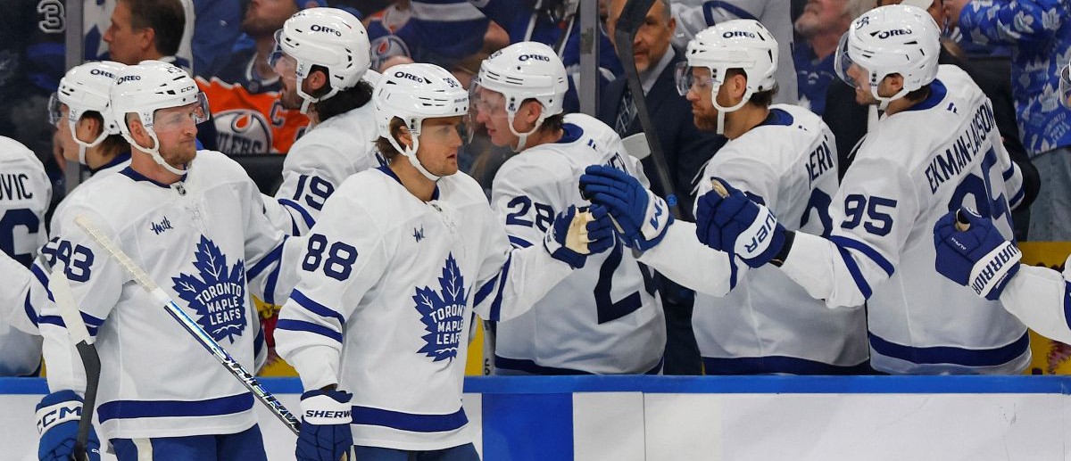 The Toronto Maple Leafs celebrate a goal scored by forward Zack MacEwen (19) during the third period against the Edmonton Oilers at Rogers Place. Mandatory Credit: Perry Nelson-Imagn Images