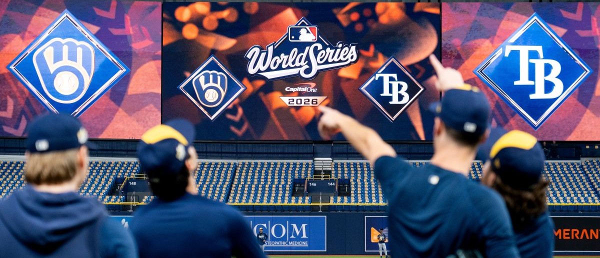 Milwaukee Brewers players point towards a fly ball during a workout and practice session ahead of Game 3 of the World Series against the Tampa Bay Rays at Tropicana Field in St.Petersburg, Florida on Oct. 25, 2026.
