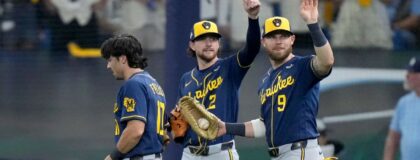 Milwaukee Brewers players Brice Turang (2) and Jake Bauers (9) signal that Milwaukee Brewers right fielder Sal Frelick (10) is okay after making a diving catch against the Tampa Bay Rays during the eighth inning during Game 3 of the World Series at Tropicana Field in St. Petersburg, Fla. on Oct 26, 2026