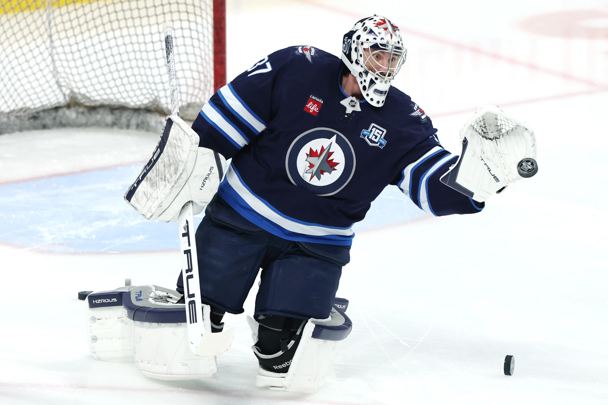 Apr 6, 2026; Winnipeg, Manitoba, CAN; Winnipeg Jets goaltender Connor Hellebuyck (37) warms up before a game against the Seattle Kraken at Canada Life Centre.