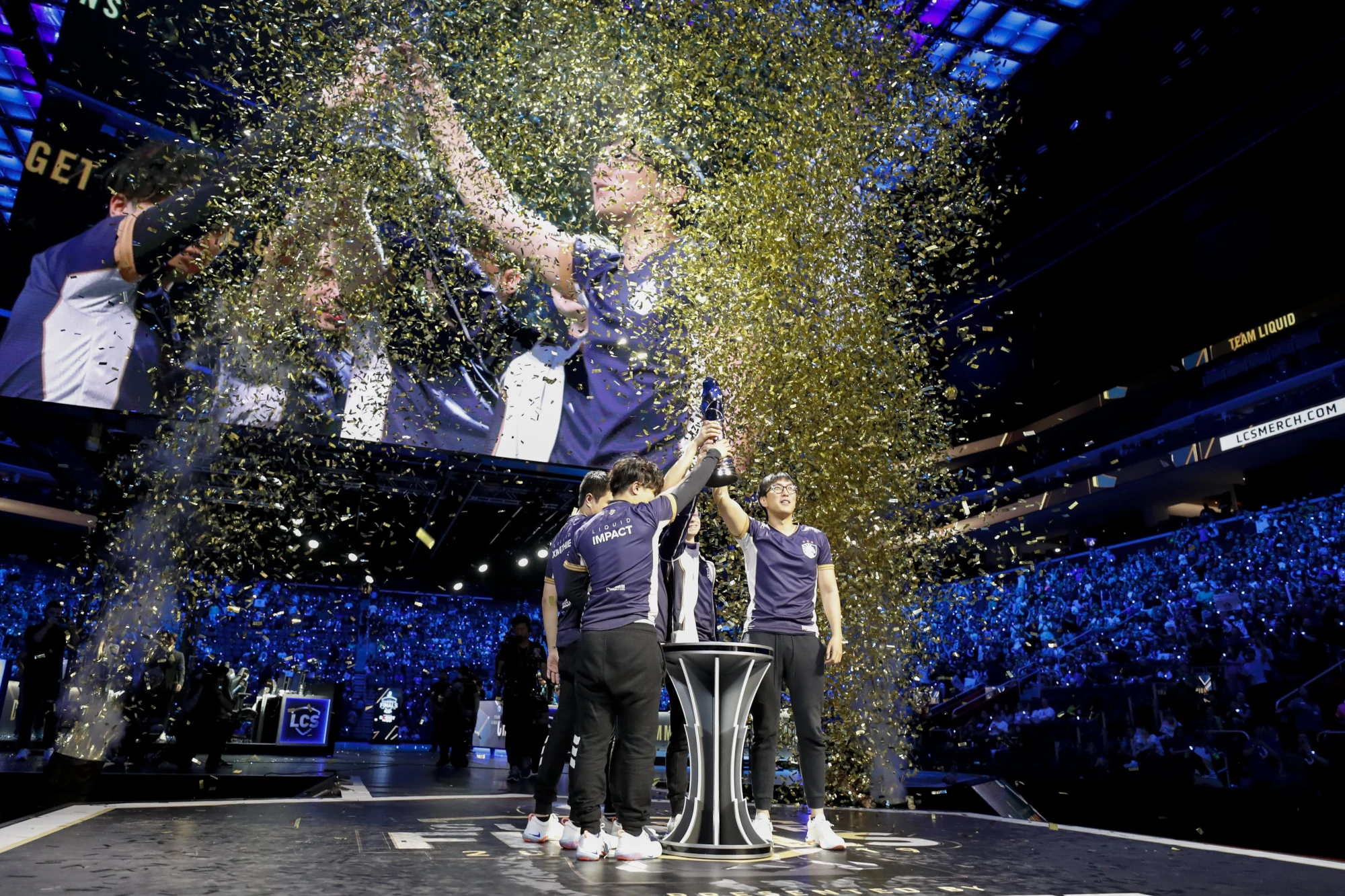 Team Liquid celebrate and lift the trophy after winning the LCS Summer Finals event against Cloud9 at Little Caesars Arena. Mandatory Credit: Raj Mehta-USA TODAY Sports. Aug 25, 2019; Detroit, MI, USA.